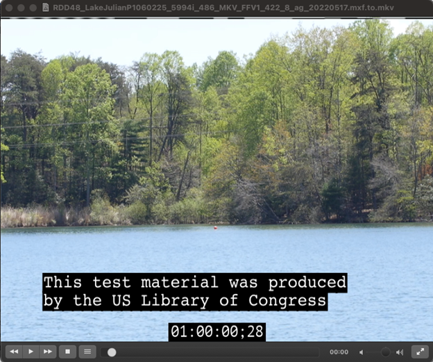 Screenshot from FFV1/MKV test file, with timecode and caption indicating material produced by the Library of Congress.